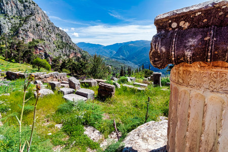 Ancient Greek column at the Delphi archaeological site. Delphi was considered the center of the world in Greek mythology.の写真素材