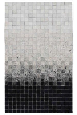 patchwork leather rug on white floor
