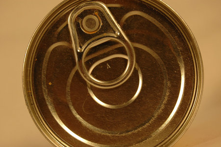 A metal silver closed can with prepared food from top 