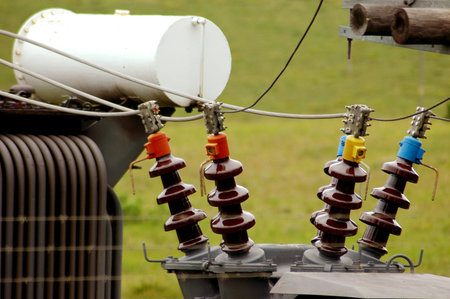 Four colorful pylons of a power station