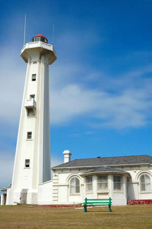 The famous white lighthouse of Port Elizabeth in the Eastern Cape province in South Africa in front of blue sky backgroundの写真素材