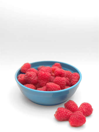 pile of raspberry isolated on a white backgroundの写真素材