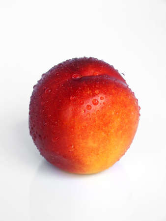 fresh nectarine on white backgroundの写真素材