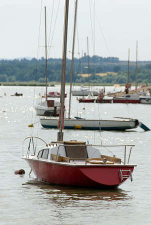 A lot of sailing boats moored on the lakeの写真素材