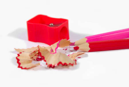 Pencil and sharpener on a white backgroundの写真素材