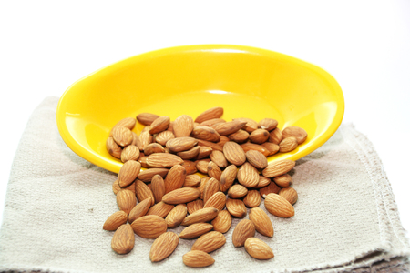 Group of almonds isolated on a white backgroundの写真素材