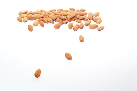 Group of almonds isolated on a white backgroundの写真素材