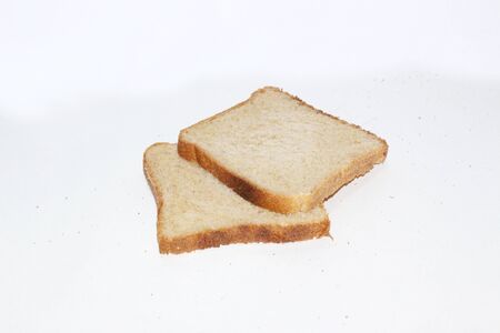 Brown bread isolated on white backgroundの写真素材