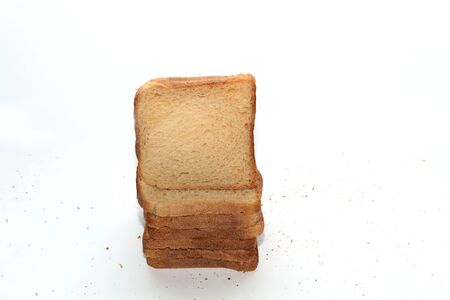 Stack of brown bread isolated on a white backgroundの写真素材