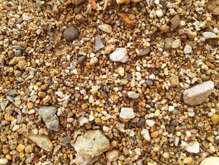 Small river stones or pebbles of various colors. colorful gravel background