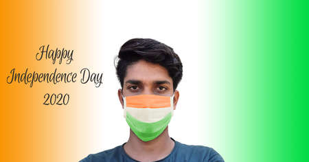 Young male model wearing face mask for corona virus independence day concept