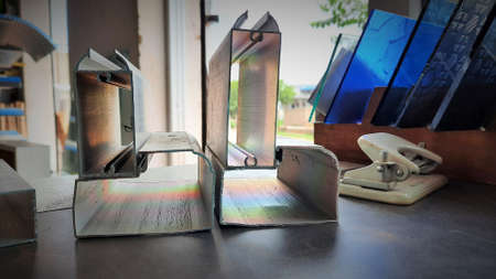 Aluminium frame piece reflects natural light as rainbow spectrum