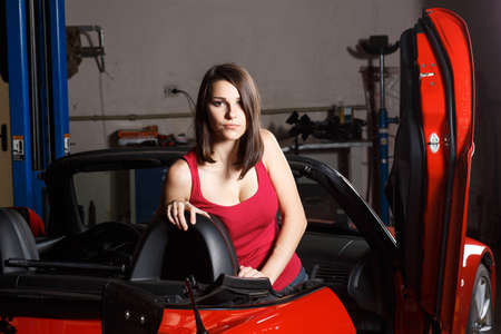girl mechanic in a garageの写真素材