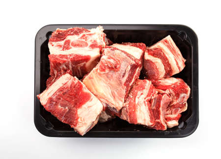 pieces of meat on a white background
