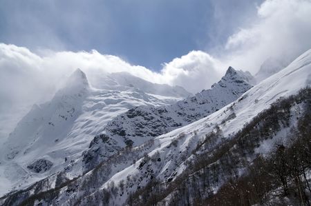 Mountain peaks in the clouds.の写真素材