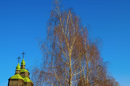 Autumn. Church and birch.の写真素材