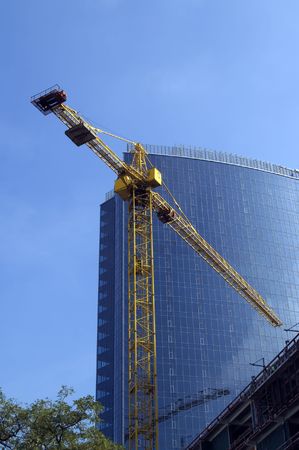 Crane on the background of building office