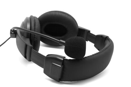 Black headphones with microphone on white backgroundの写真素材
