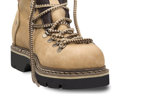 Hiking boot on white background  Close-up view 