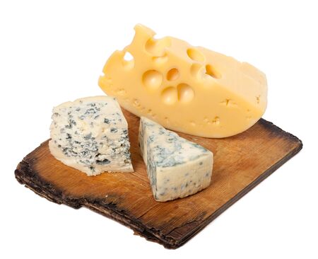 Various types of cheese on old wooden kitchen board  Isolated on white background 