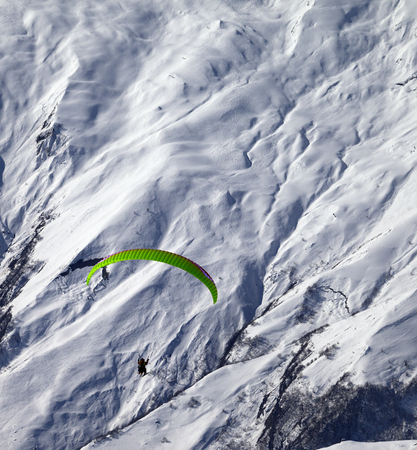 Speed flying in winter mountains. Caucasus Mountains. Georgia, ski resort Gudauri.