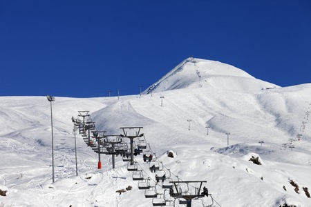 Winter mountains and ski slope at nice sun day. Caucasus Mountains, Georgia. Ski resort Gudauri.のeditorial素材