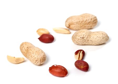 Peanuts isolated on white background. Selective focus.の写真素材
