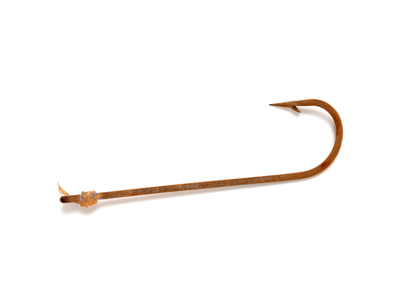 Rusty old fishhook. Isolated on white background.の写真素材