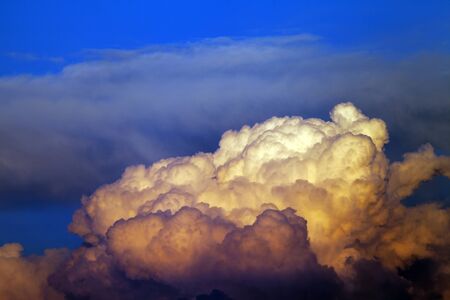 Sunset cloudy sky over the seaの写真素材