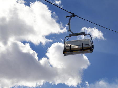 Chair-lift and sunlight sky at evening
