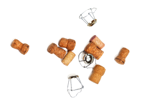 Corks from champagne wine and muselets. Isolated on white background with copyspace. View from above.の写真素材