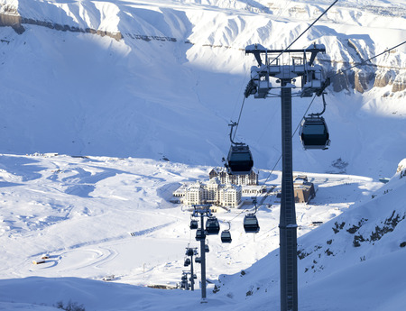 Gondola lift on ski resort at winter sun evening. Greater Caucasus, Mount Shahdagh, Azerbaijan.のeditorial素材