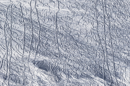 Snow off-piste slope for freeride with traces from skis and snowboards at sun winter morning. Caucasus Mountains, Georgia, region Gudauriの写真素材