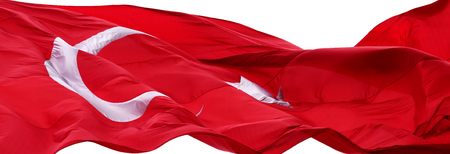 Waving flag of Turkey. Isolated on white background. Close-up view.の写真素材