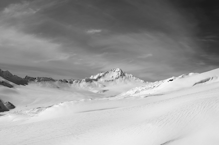 Black and white snowy mountains at winter. Caucasus Mountains, freeriding slope of mount Elbrus.の写真素材