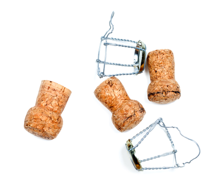 Corks from wine and muselets after party. Isolated on white background. View from above.の写真素材