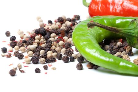 Mix of hot peppers isolated on white backgroundの写真素材