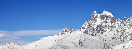 Panoramic view on Mount Ushba in winter at sunny day. Snowy Caucasus Mountains. Svaneti region of Georgia.の写真素材
