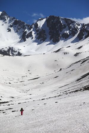 Hiker in high snowy mountains at nice spring day. Turkey, Kachkar Mountains (highest part of Pontic Mountains).の写真素材