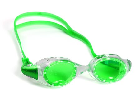 Light green goggles for swimming with water drops. Isolated on white background.の写真素材