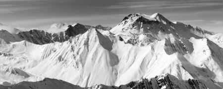 Black and white panoramic view on snowy mountains in winter. Caucasus Mountains, Georgia, region Gudauri.の写真素材