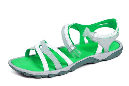 Green summer sandal isolated on white backgroundの写真素材