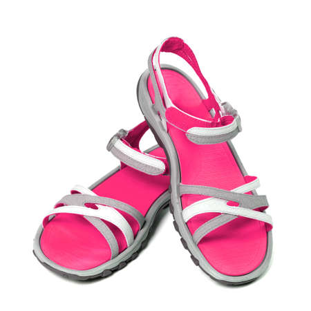 Pair of female summer sandals. Isolated on white background.の写真素材