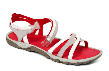 Red female summer sandal isolated on white backgroundの写真素材