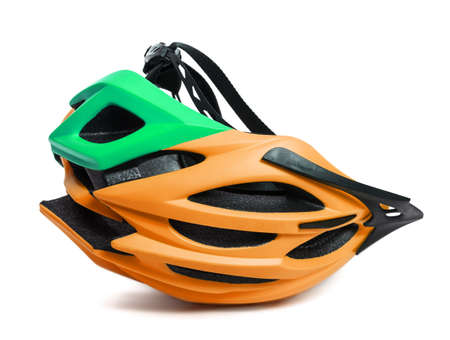 Multicolor bicycle helmet upside down isolated on white backgroundの写真素材
