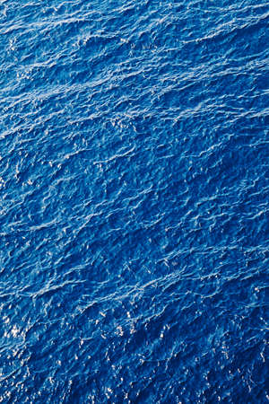 View on blue sunlit sea at sun summer day. Natural background.の写真素材