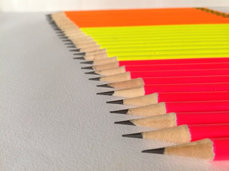 Neon colors pencils close up shortの素材