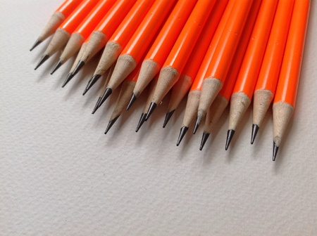 Neon colors pencils on white background
