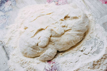 DIY pizza. homemade pizza step by step instruction.pizza step 1 roll out the pizza dough.の写真素材