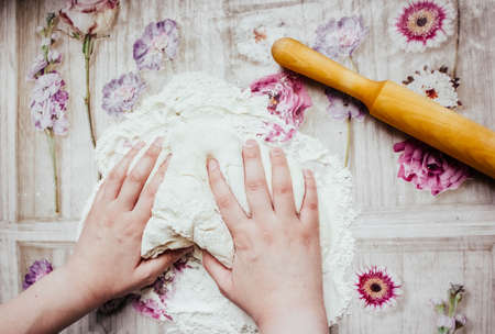 DIY pizza. homemade pizza step by step instruction.pizza step 1 roll out the pizza dough.の写真素材